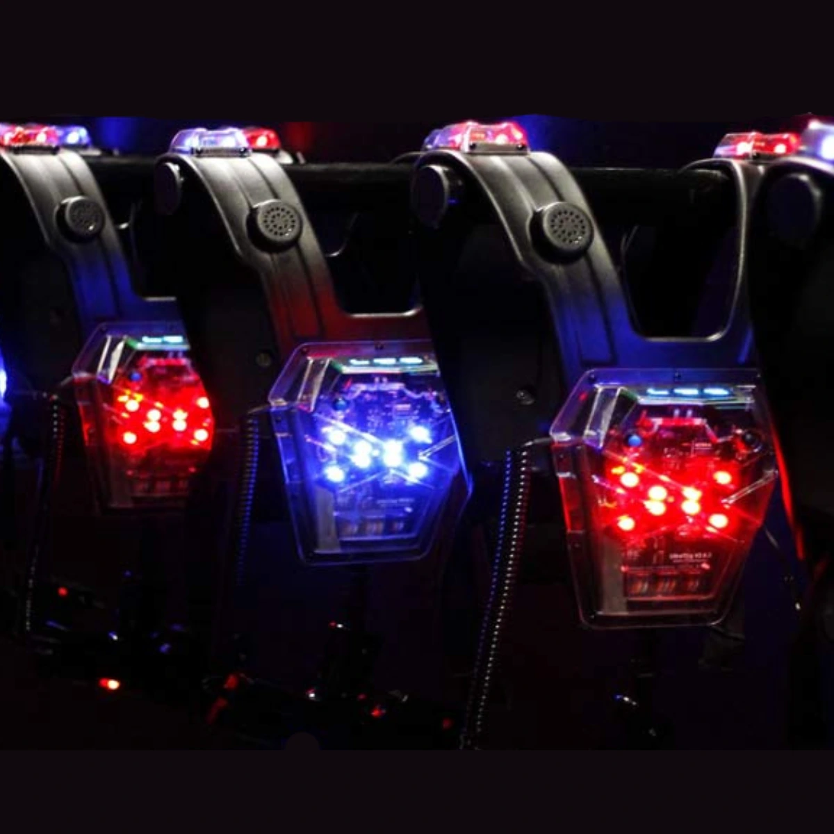 Laserguns - UltraTag Laser tag vests with blue en red colours hanging on the wall
